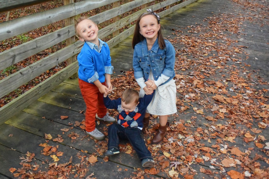 Ava and Charlie hold up Mason in tgiving TCP