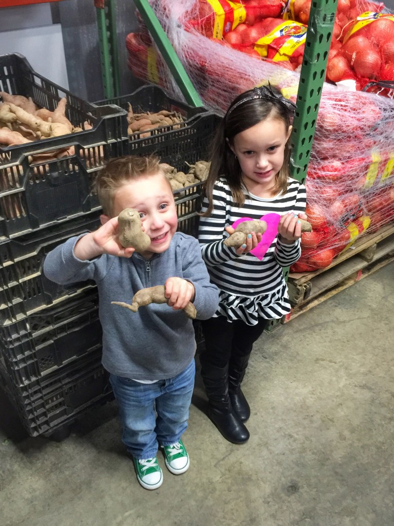 Ava and Charlie with sweet potatoes