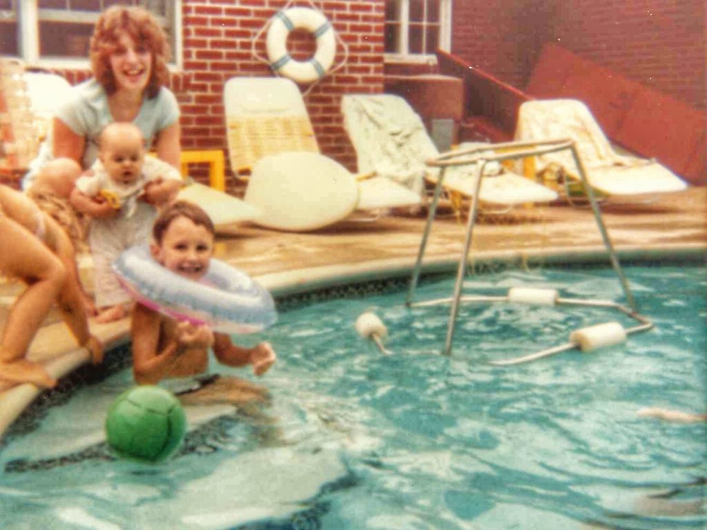 Adrian in the pool with Aunt Beth 1981