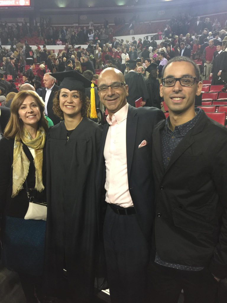 Victor and family at graduation