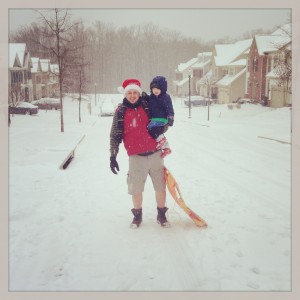 Daddy and Charlie sledding