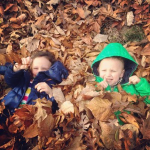 ava and charlie in leaves 2014