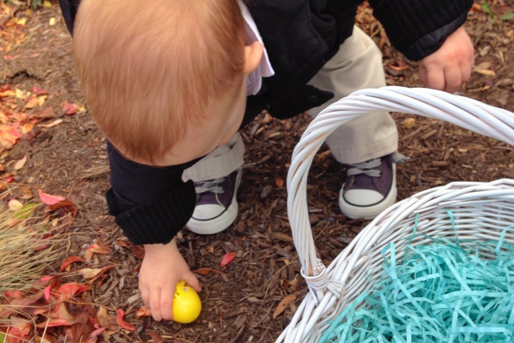 Mason picking up Easter eggs