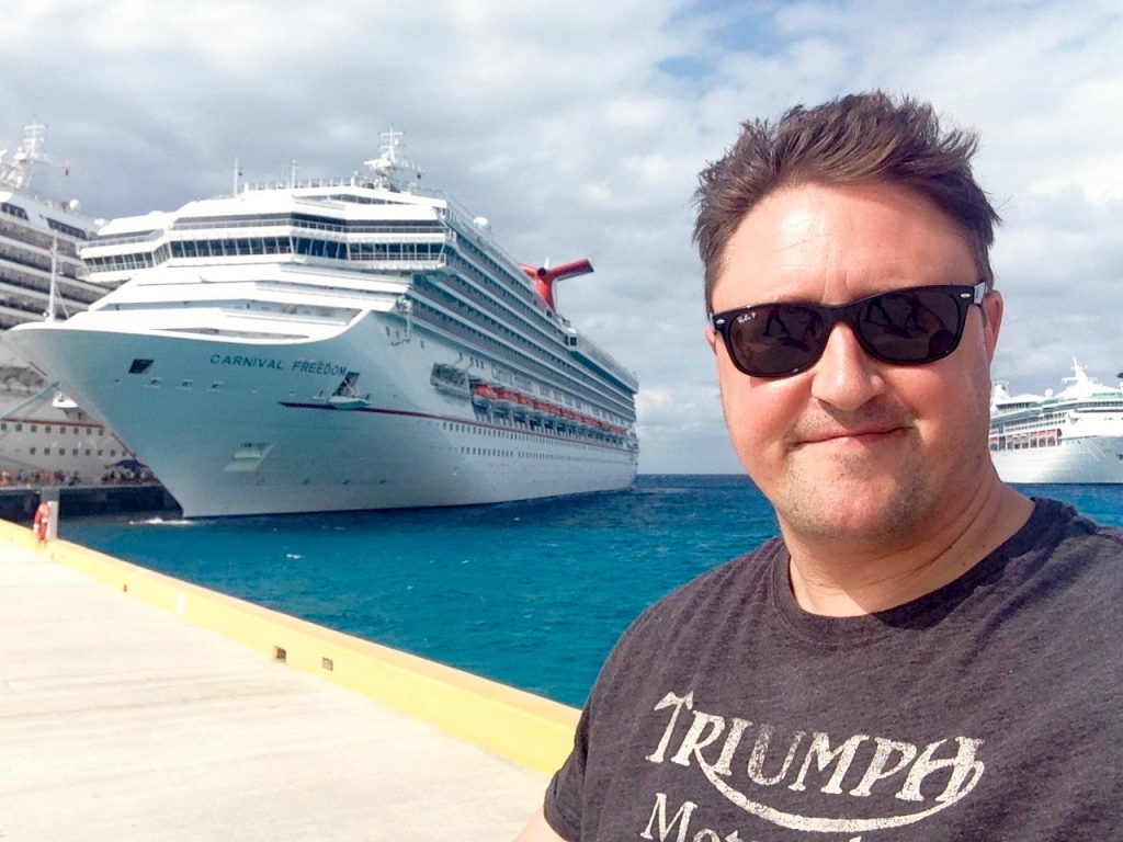 Adrian in front of Carnival Freedom