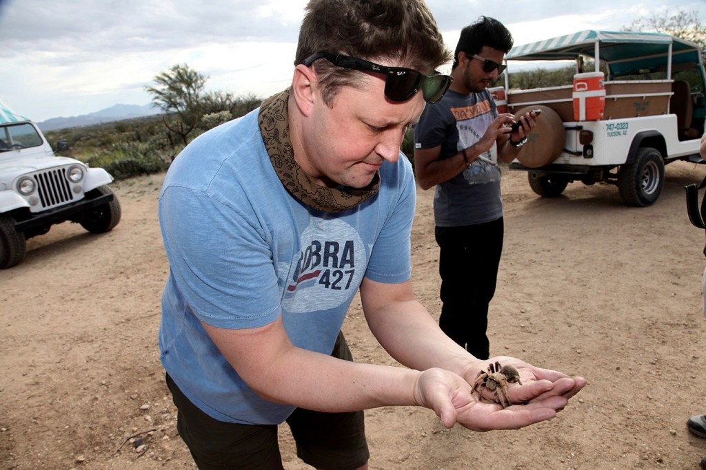 Adrian holding Arizona Blonde Tarantula in Sonoran Desert